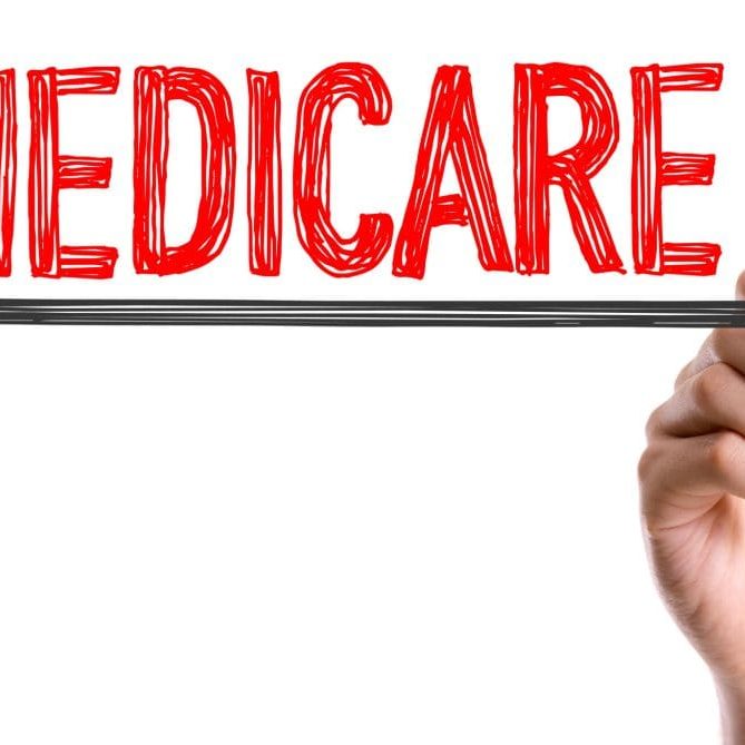 Hand,With,Marker,Writing,The,Word,Medicare